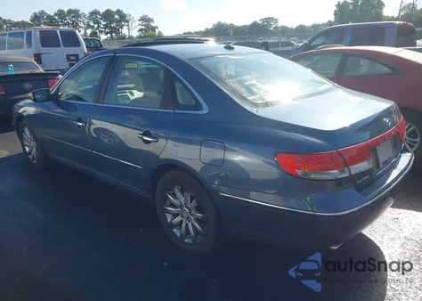 2009 Hyundai Azera Limited z USA, uszkodzony, nr VIN KMHFC46FX9A343602